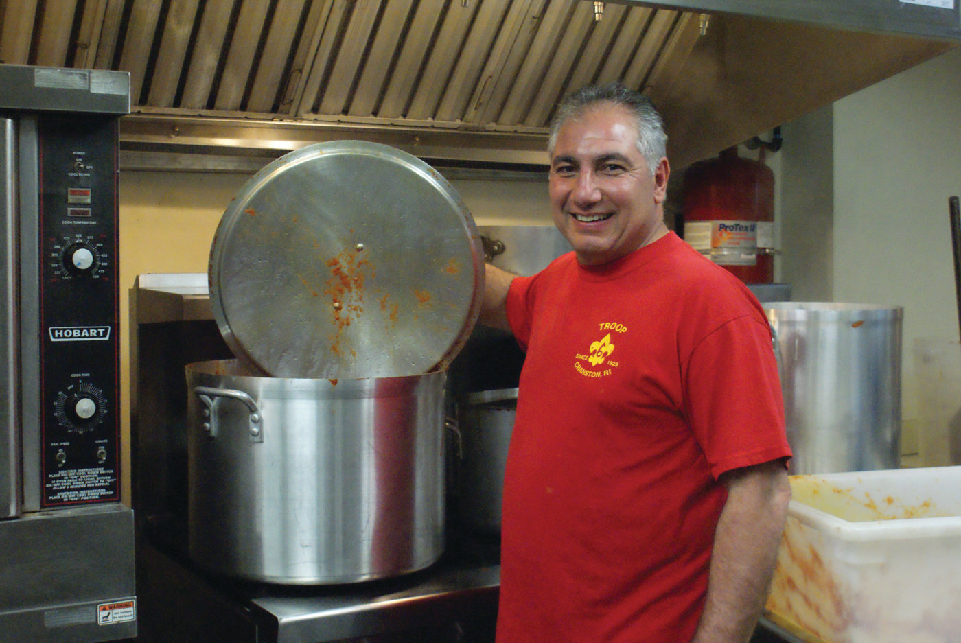 HEAD CHEF: Richard Lisi, a volunteer with Troop 6 Cranston, served as the head chef and led volunteers in the kitchen. In total, they cooked more than 60 pounds of pasta, 50 gallons of sauce and kneaded more than 100 pounds of dough for homemade Italian bread.